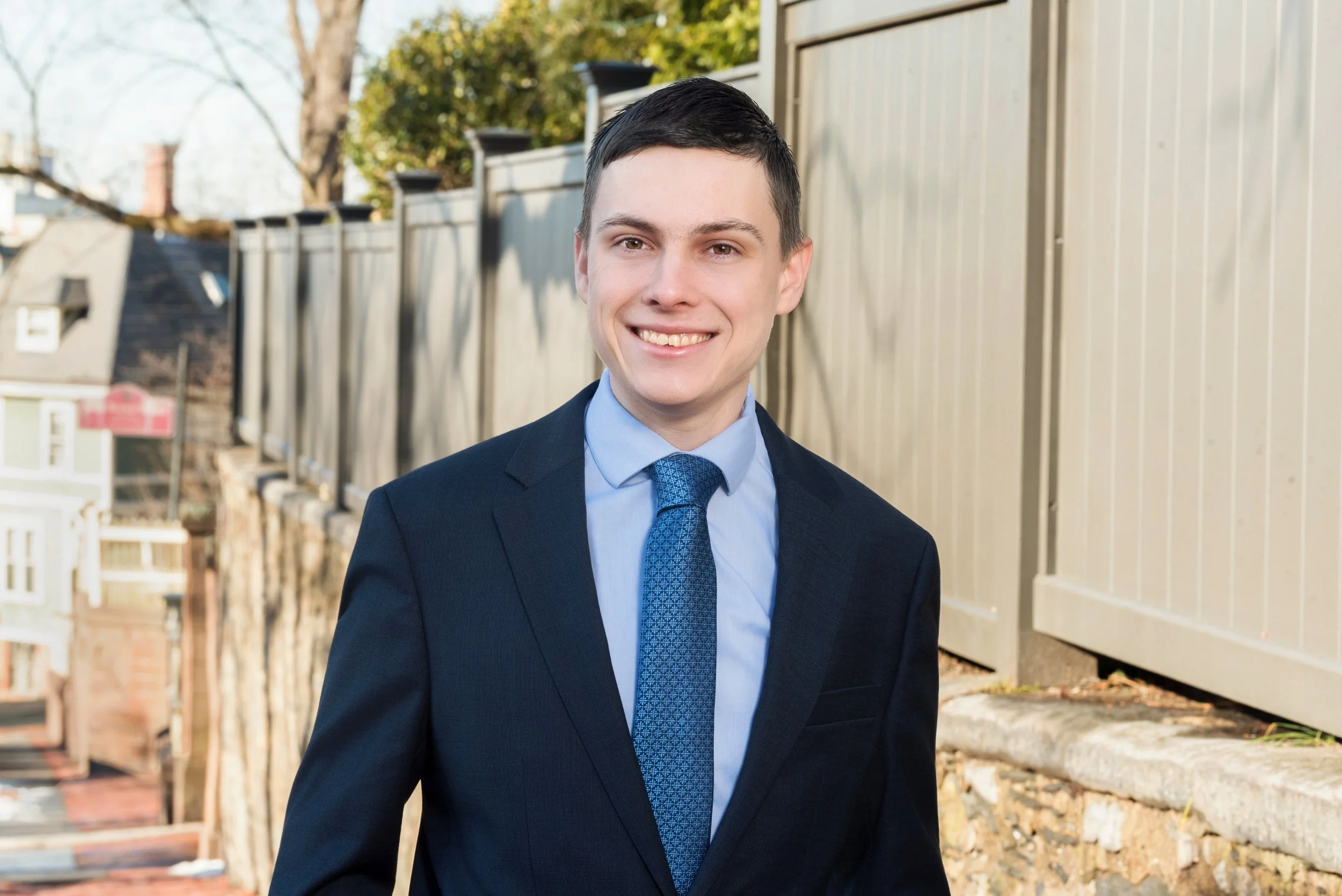 Michael Garman standing on a College Hill sidewalk